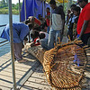 sharon osberg (SharonO) > This is a fishing trap.  People go back and forth across the river all day long casting this trap out, then collecting it.
